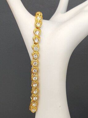 Gold and faux diamond heart tennis bracelet